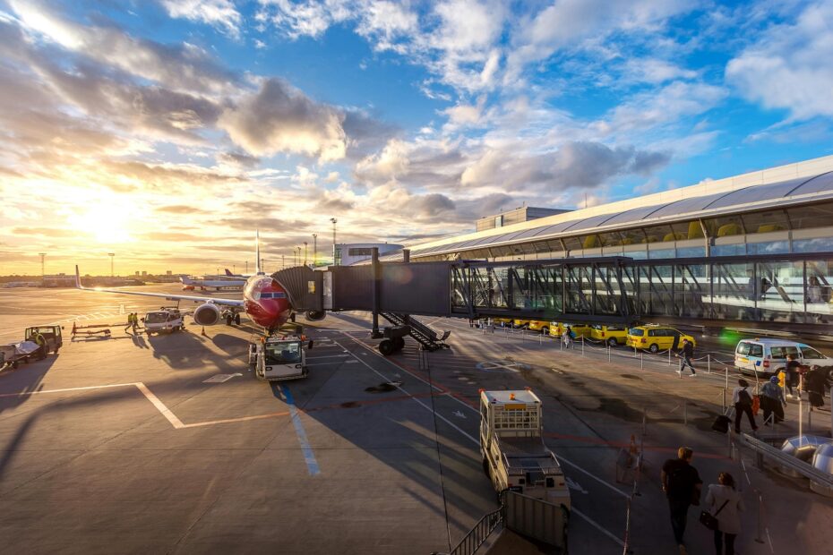 Red airplane at an airport
